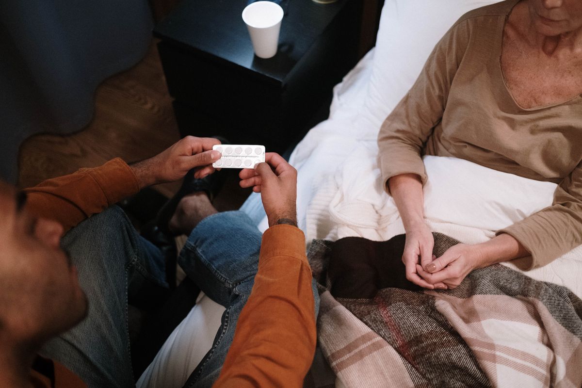 A clinician managing a patient's medication