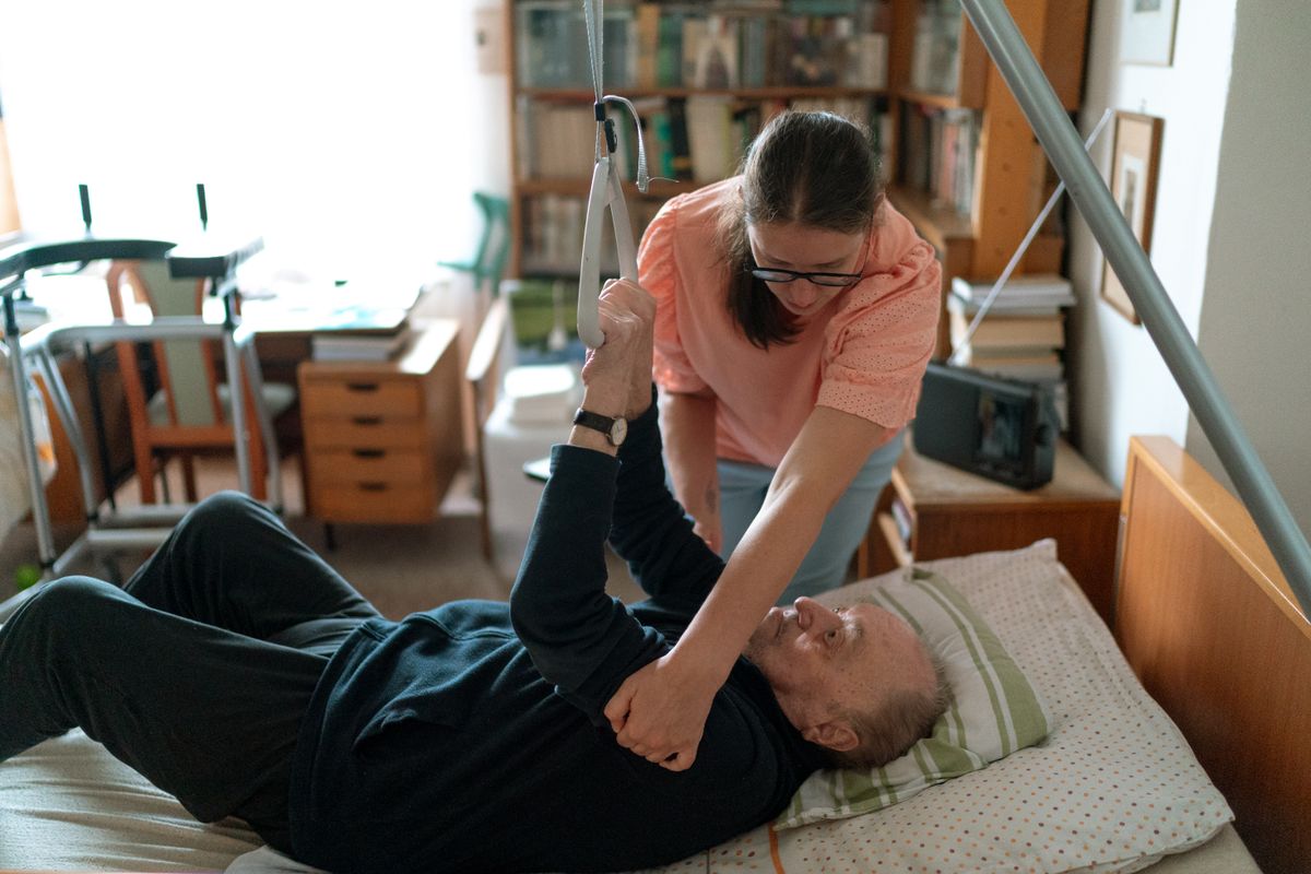 A caregiver assisting a client with personal care