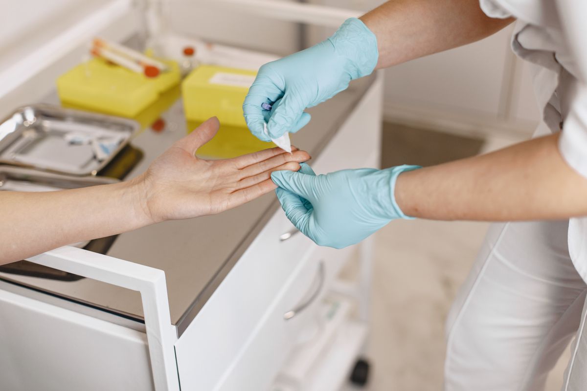 A nurse performing wound care